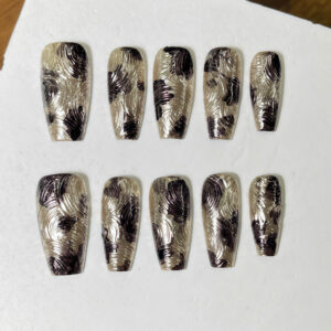 Gold black metallic press on nails with abstract textured chrome design, elegant handmade luxury nail art