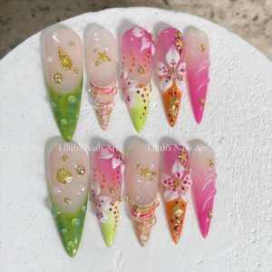 Tropical beach press on nails with 3d hibiscus flowers, gold sea shells, and realistic water droplets on stiletto tips